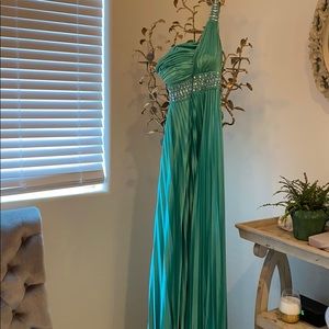 Turquoise prom dress with open back